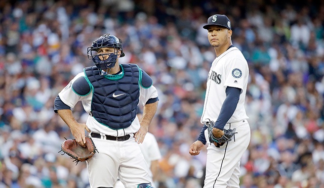 The Associated Press Mariners starting pitcher Taijuan Walker, right, was optioned to Triple-A Tacoma on Monday.