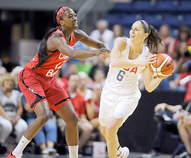 The Associated Press United States’ Sue Bird, right, is guarded by Canada’s Tamara Tatham during an exhibition game last month. The two nations square off Friday in the Summer Olympics in Rio de Janeiro.