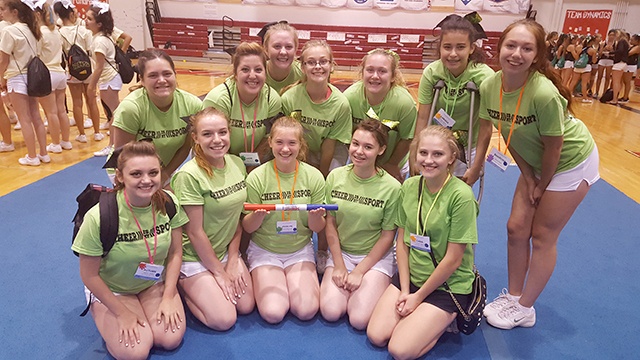 The Port Angeles High School cheerleading team earned a spirit stick while attending the National Cheerleaders Association camp at Central Washington University in Ellensburg. Spirit sticks are awarded to teams that exemplify the Association’s sense of spirit. Team members Autumn Sheldon, Paulina Crawford, Sharona Klahn and Laura Rooney all were nominated as All-American cheerleaders. Team members, back row, standing from left, Tylee Raemer, Sadie Decker, Skylar Tomason, Laura Rooney, Madison Belbin, Carissa Ramos, Sharona Klahn and front row, Autumn Sheldon, Paulina Crawford, Jocelyn Reifenstahl, Brianna Carter and Cara Stalford. Not pictured: cheer coach DaLasa Doane.