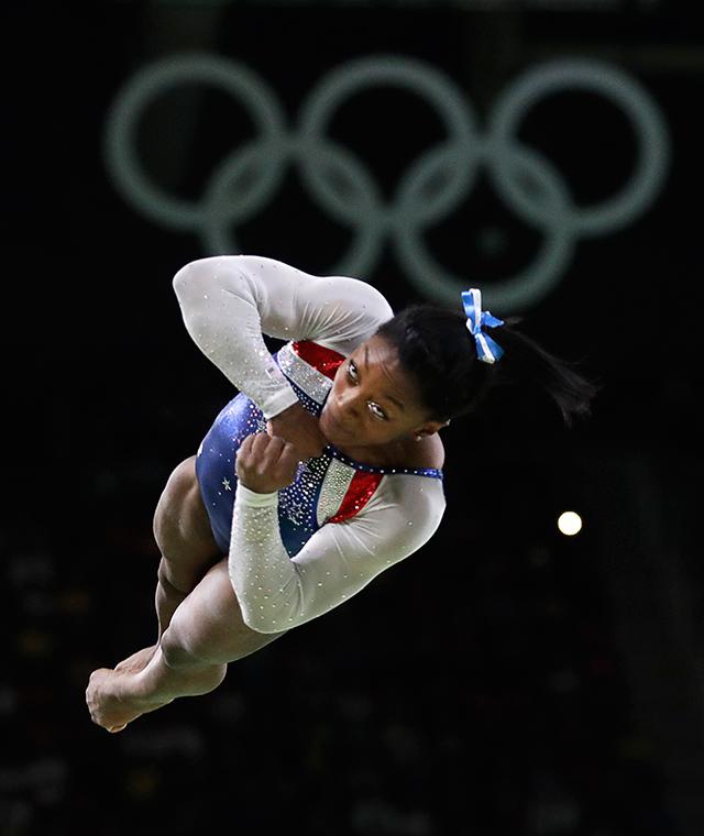 The Associated Press United States’ Simone Biles performs on the vault during the artistic gymnastics women’s individual all-around final at the 2016 Summer Olympics in Rio de Janeiro, Brazil on Thursday. Biles won the gold medal in the individual all-around competition.