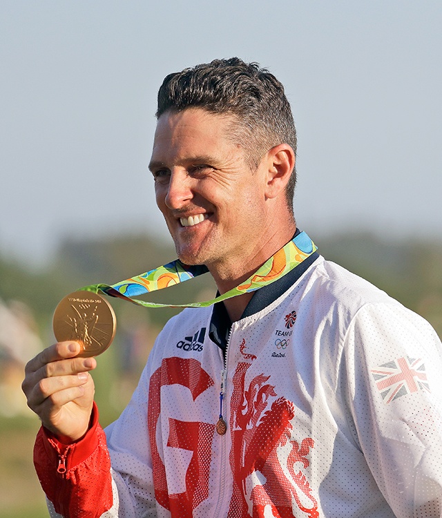 The Associated Press Justin Rose of Great Britain, holds up the gold medal after winning the men’s golf event at the 2016 Summer Olympics in Rio de Janeiro, Brazil, on Sunday.