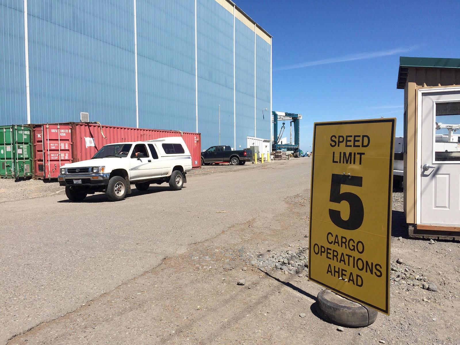 Port of Port Angeles commissioners voted Monday to allow city police to enforce traffic laws on port property including North Cedar Street, a site of intermittent, heavy truck traffic. (Paul Gottlieb/Peninsula Daily News)