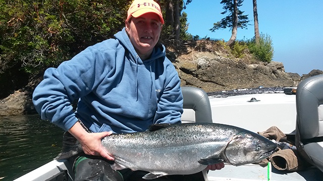 Pete Rosko Liz Thomson of Port Angeles caught this hatchery chinook on a 1½-ounce green-white pearl Kandlefish jig off Freshwater Bay last Sunday.