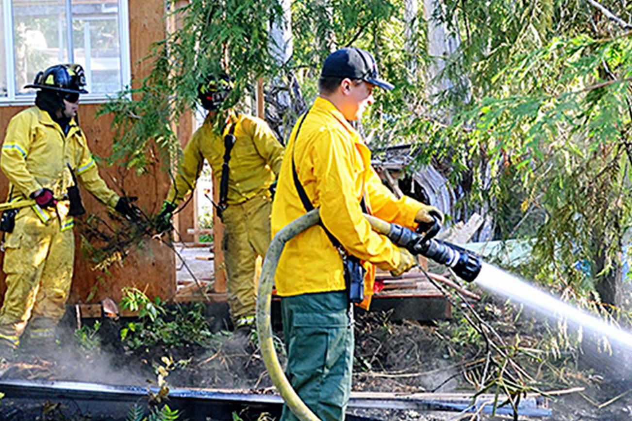 Small brush fire on Four Corners Road stopped