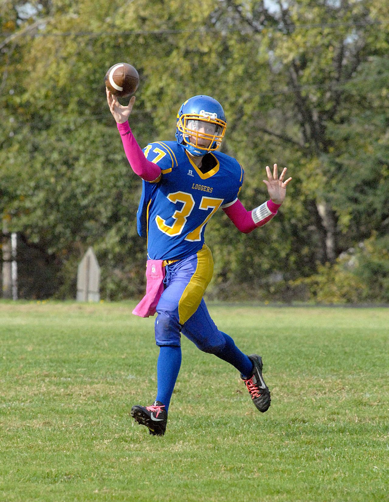 Keith Thorpe/Peninsula Daily News Crescent quarterback KC Spencer throws the football during a game against Clallam Bay last season. Spencer, a junior, assumed the starting quarterback spot late last season.