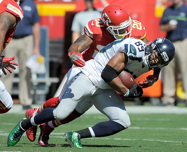 The Associated Press Seattle Seahawks wide receiver Doug Baldwin (89) is tackled by Kansas City Chiefs defensive back Steven Nelson (20) during the first half of an NFL preseason football game.