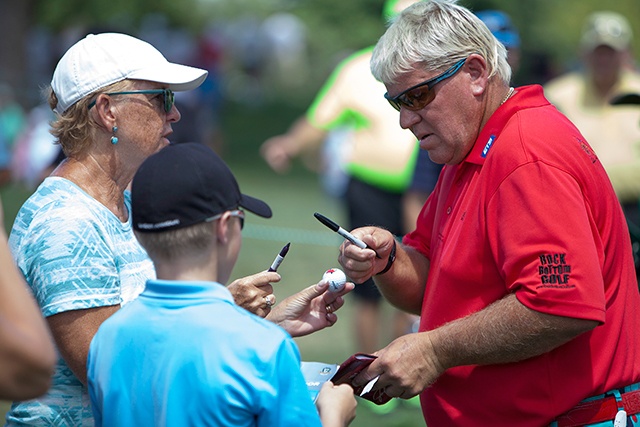 The Associated Press John Daly signs autographs during the U.S. Senior Open. Daly is making his debut this weekend at the Champions Tour’s Boeing Classic at TPC Snoqualmie Ridge in Snoqualmie.