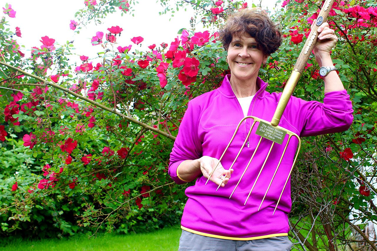 Ingrid Nixon earned the Golden Pitchfork as champion liar during the 2014 Liars Contest hosted by The Story People. The Sequim resident will be featured in the 44th annual National Storytelling Festival this October in Jonesborough, Tenn. (Ingrid Nixon)