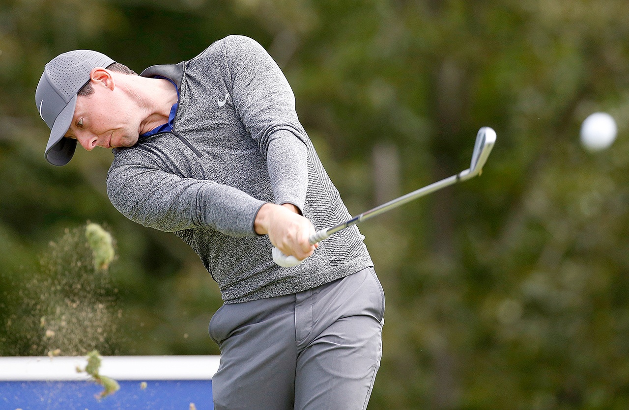 Rory McIlroy, of Northern Ireland, tees off on the 17th hole during the final round of the Deutsche Bank Championship golf tournament in Norton, Mass., Monday, Sept. 5, 2016. (AP Photo/Michael Dwyer)