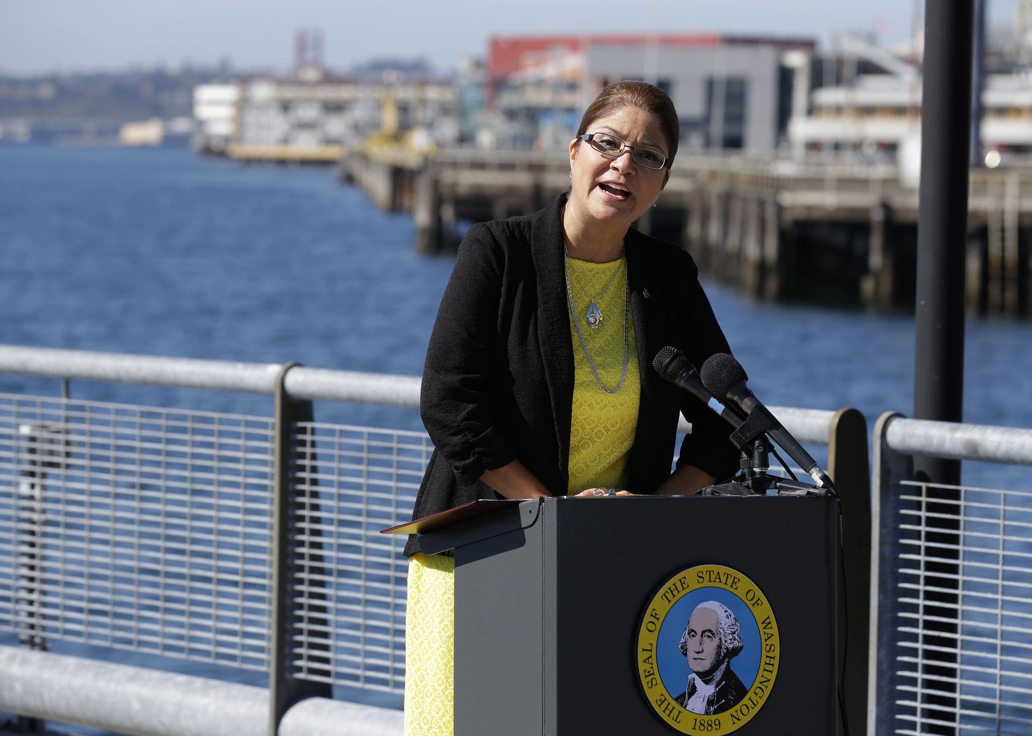 Maia Bellon, director of the state Department of Ecology, speaks at a news conference Thursday overlooking Elliott Bay in Seattle. (Ted S. Warren/The Associated Press)