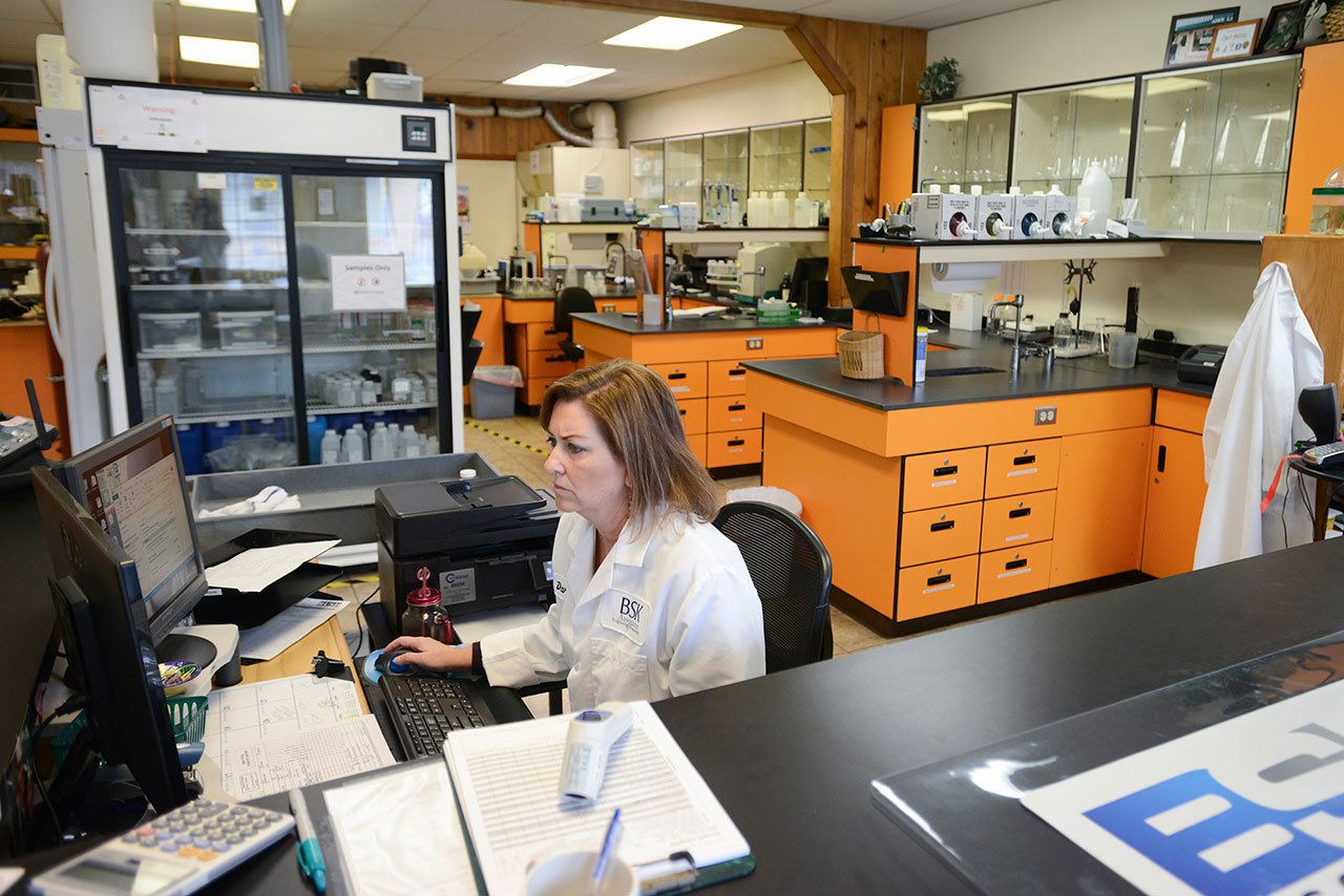 Lab technician Darlene West works at BSK Labs in Vancouver, Wash. (Ariane Kunze/The Columbian via AP)