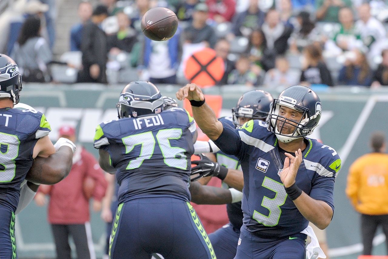 The Associated Press Seattle quarterback Russell Wilson (3) throws a pass during the Seahawks’ 27-17 win over the New York Jets.