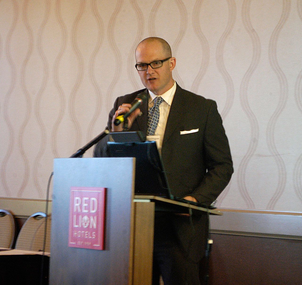 Dr. Joshua Jones, Olympic Medical Center chief physician officer, speaks during the opening of the NAMI statewide conference at the Red Lion Hotel in Port Angeles. (Chris McDaniel/Peninsula Daily News)