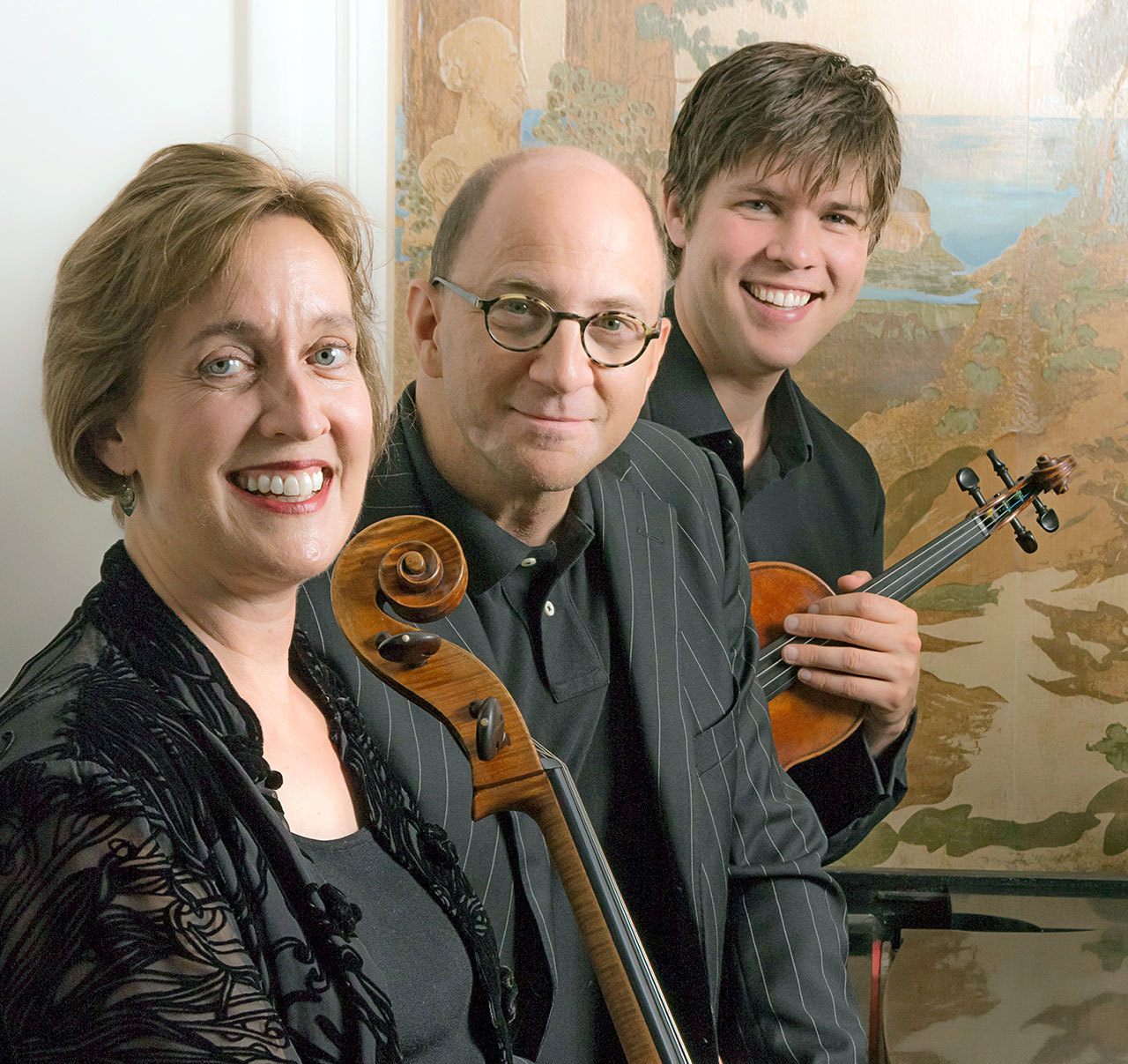 The Onyx Chamber Players — a trio consisting of, from left, cellist Meg Brennand, pianist David White and violinist James Garlick — will explore 300 years of classical music during a performance Saturday evening at Peninsula College. (William Stickney)