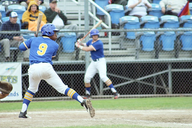 Caitlin Shiffman Alex Junior awaits a pitch while playing for the Kitsap BlueJackets during the 2015 West Coast League season. Junior, along with Dylan Vchulek, are the first players signed by the Port Angeles Lefties.