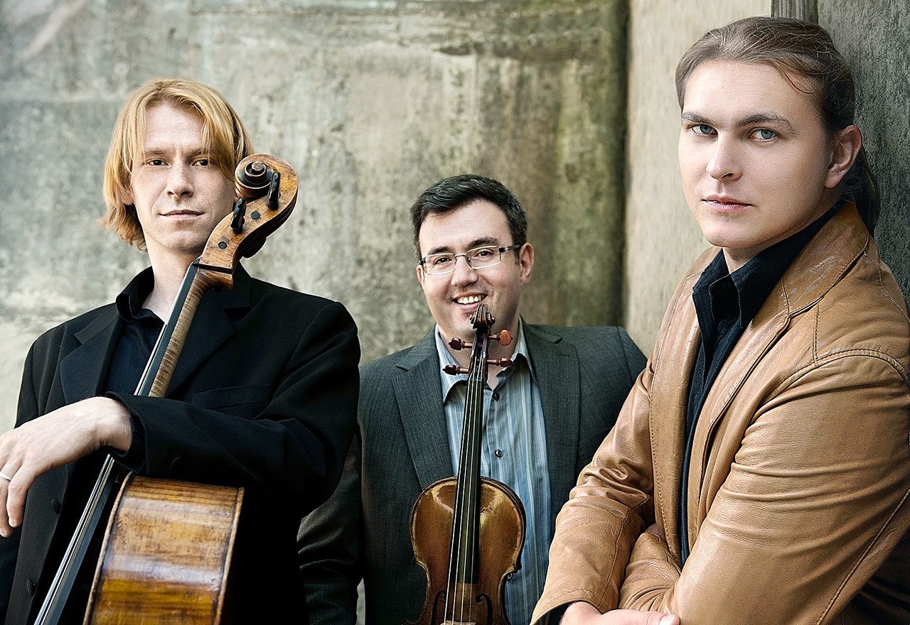 The Hermitage Piano Trio — consisting of pianist Ilya Kazantsev, at right cellist Sergey Antonov, at left, and violinist Misha Keylin — will perform at 2 p.m. Sunday at Joseph F. Wheeler Theater, 25 Eisenhower Way. — Melvin Kaplan, Inc.