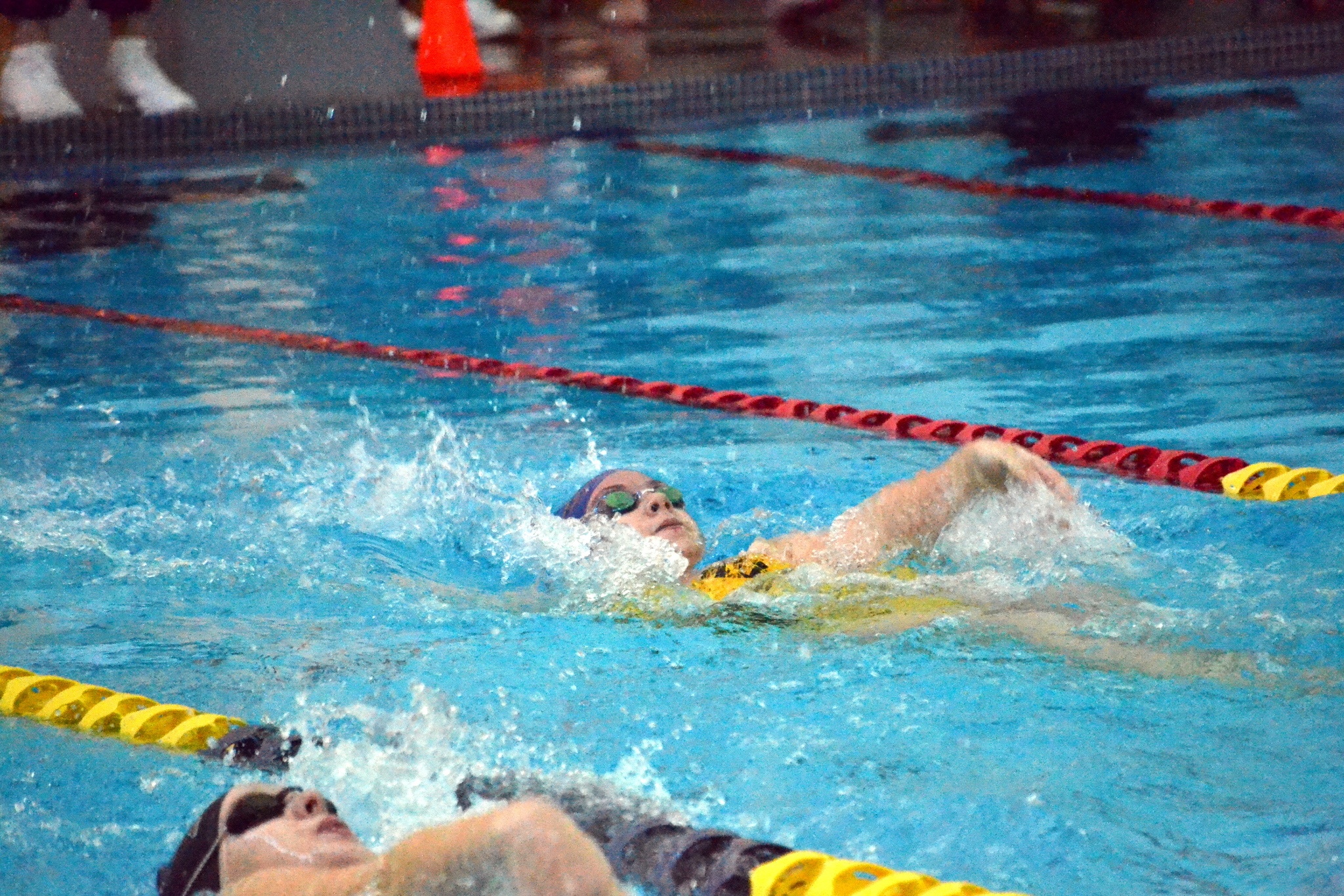 Sydney Swanson swims the 100 backstroke in the YMCA of Sequim. The new facility will host a grand opening Sunday. (Matthew Nash/Olympic Peninsula News Group)