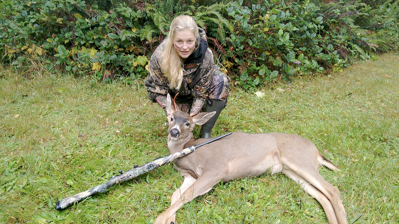 Kylie Bushnell, age 12, bagged this spike in the Black Diamond area near Port Angeles while hunting with her grandfather Jay McIlwain of Port Angeles. It was the first-ever hunting trip for Bushnell, an avid trap shooter.