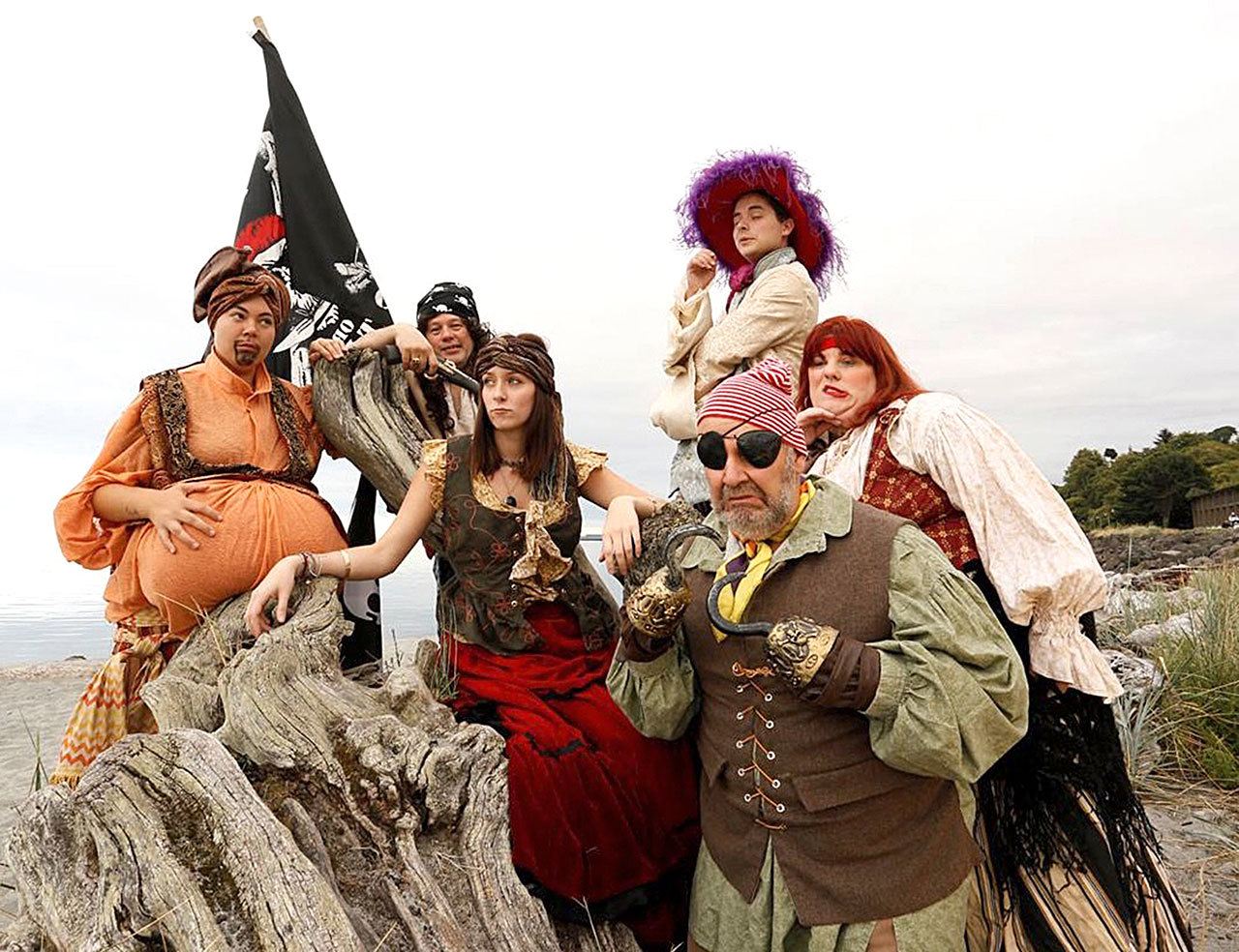 “The Sea is a Restless Whore,” a play produced by Peninsula College, will open Wednesday at The Metta Room in Port Angeles. From left are Marissa LeeAnn Rose Wilson, Richard Stephens, Brianna Miles, Mark Valentine (foreground), Steven Canepa and Laci Trussell. (Peninsula College)