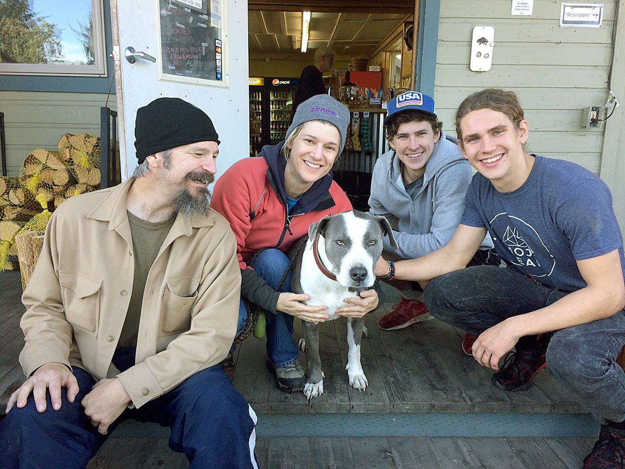 Jacob Soule and Karen Anderson were reunited with their dog Miley thanks to brothers Justin and Adam from Montana, who found the dog while hiking the Mount Walker trail. (Valorie Williams)