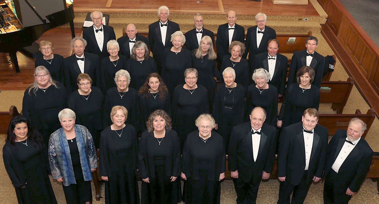 RainShadow Chorale members are, starting in back from left, Doug Rodgers, Will Kalb, Don Landstra, Franz Witte, Glen Koch, Malcolm Hepworth, Pat Rodgers, Paul Becker, Linda Bach, Dorothy Hensey, Liz Hazen, Sally Chapin, Bev Schaaf, Claus Janssen, Brian Goldstein, Sue Reid, Sheila Hunt-Witte, Pat Nerison, Phina Pipia, Colleen Johnson, Helen Lauritzen, Weezie Jenkins and Kathleen Schott, Cherry Chenruk-Geelan, Rebecca Rottsolk, Diana Seifert, Jody Bower, Pat Vaughan, Bob McCauley, Kris Lott and Rick Kirkwood.