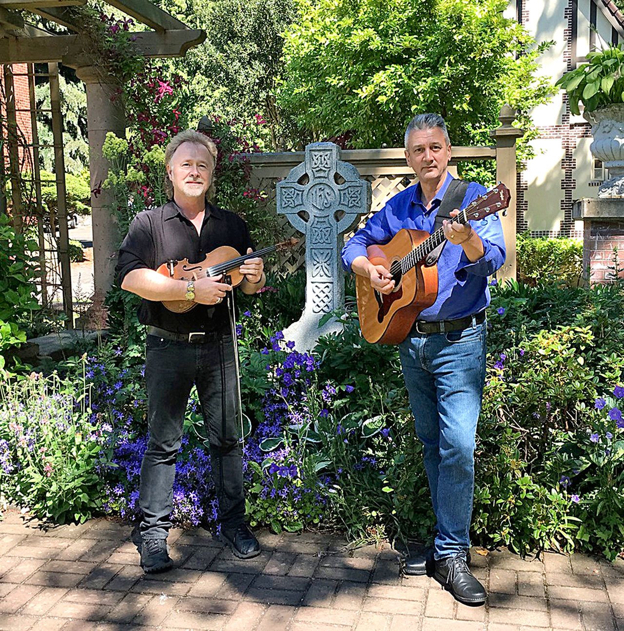 Olympic Theatre Arts, 414 N. Sequim Ave., at 3 p.m. Sunday will present “A Very Whisky Christmas,” featuring the Whisky Minstrels, seen here. The duo consists of Nolan Murray, left, and Bruce Coughlan. (Whisky Minstrels)