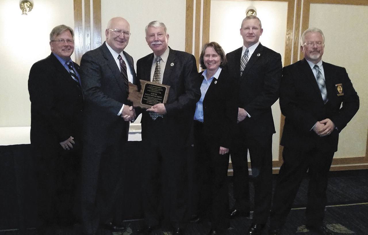 Last week, leaders of the Sequim Police Department accepted its accreditation plaque in Lake Chelan at the Washington Association of Sheriffs & Police Chiefs (WASPC) semi-annual training conference. On-hand for the ceremony were, from left, Sequim Police Sgt. Darrell Nelson, Police Chief Bill Dickinson, WASPC President and Kennewick Police Chief Ken Hohenberg, Sequim Deputy Chief Sheri Crain and Sgts. Mike Hill and Sean Madison.
