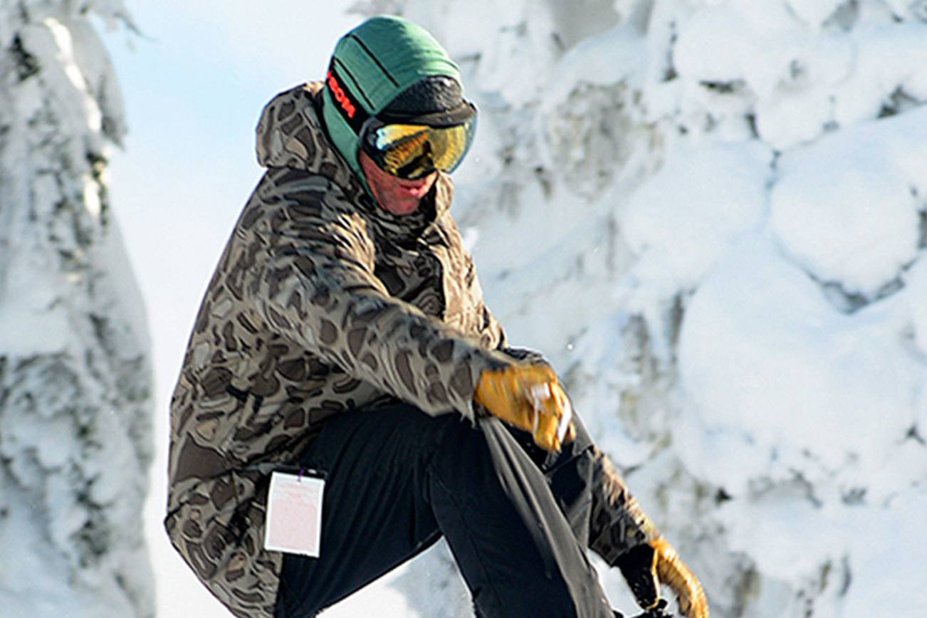 GNU Snowboards team rider Temple Cummins snowboards at Hurricane Ridge on Sunday. (Jesse Major/Peninsula Daily News)