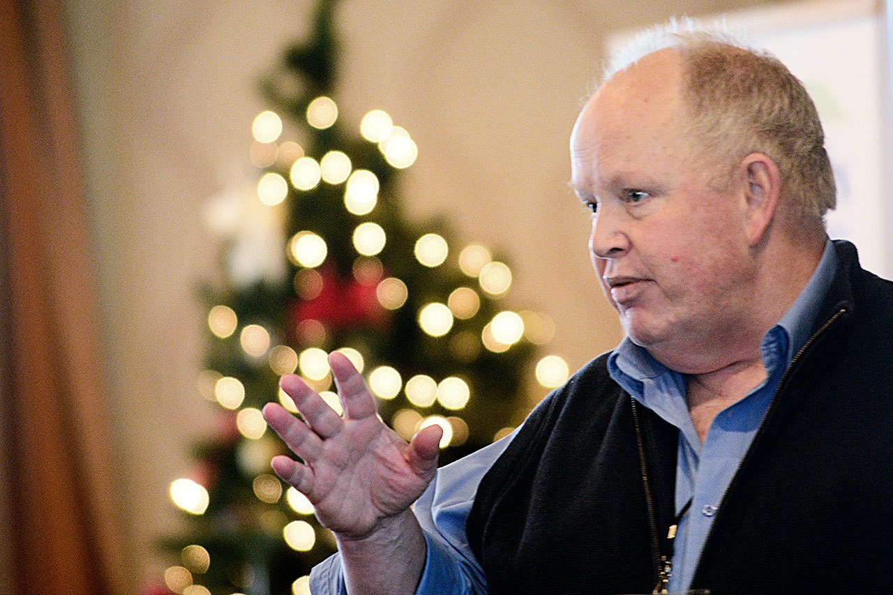 Doc Robinson, director of Serenity House of Clallam County, speaks during the Port Angeles Chamber of Commerce luncheon Wednesday. (Jesse Major/Peninsula Daily News)