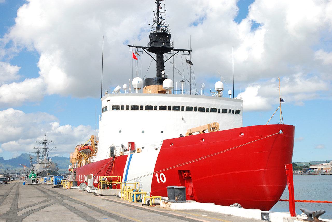The U.S. Coast Guard Cutter Polar Star rests by a dock in Pearl Harbor, Hawaii, on Monday. The only U.S. ship capable of breaking through Antarctica’s thick ice is undergoing repairs in balmy Hawaii this week as it prepares to head south. (Audrey McAvoy/The Associated Press)