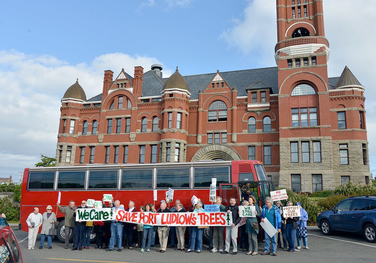 Port Ludlow residents protest Port Ludlow Associates’ timber harvest in front of the Jefferson County Courthouse in April. (William Dean)