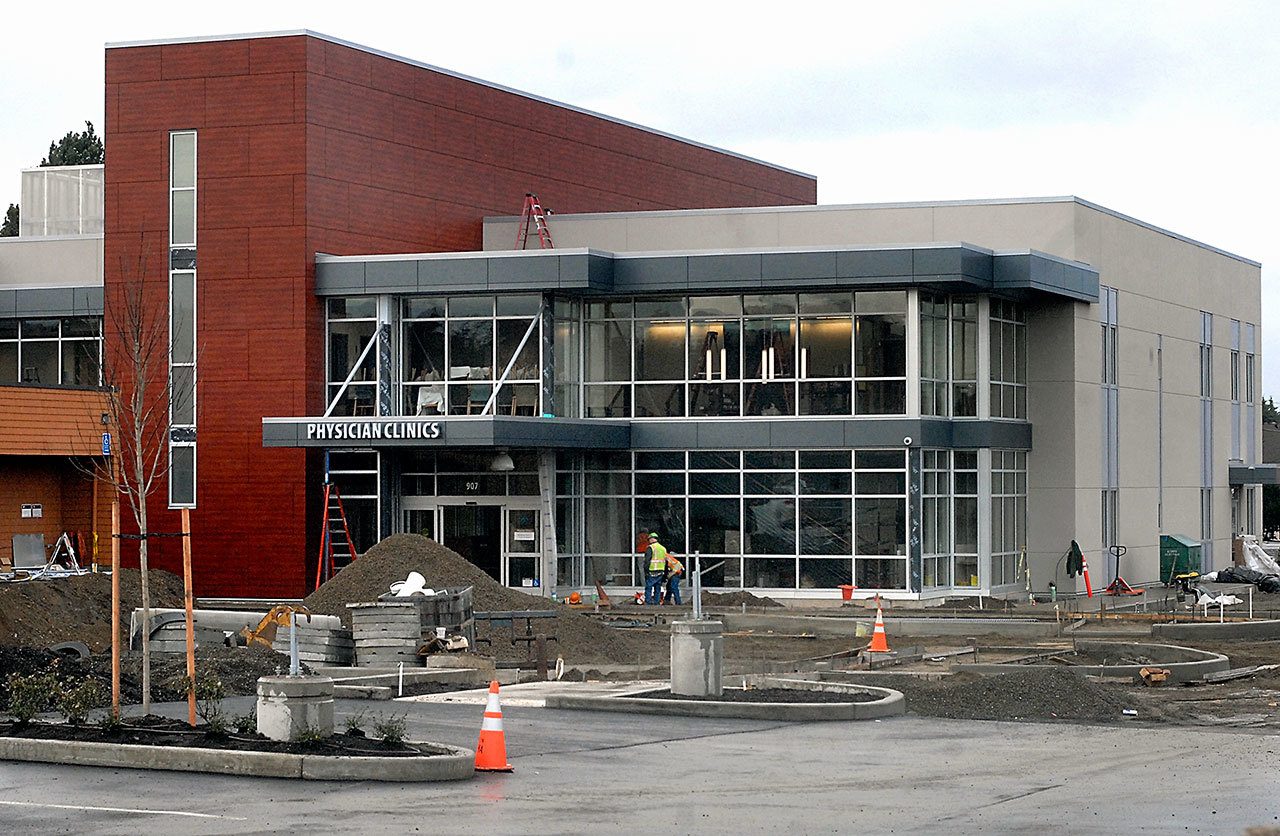 Work continues on Thursday on a medical office building being built by Olympic Medical Center south of the hospital in Port Angeles. (Keith Thorpe/Peninsula Daily News)