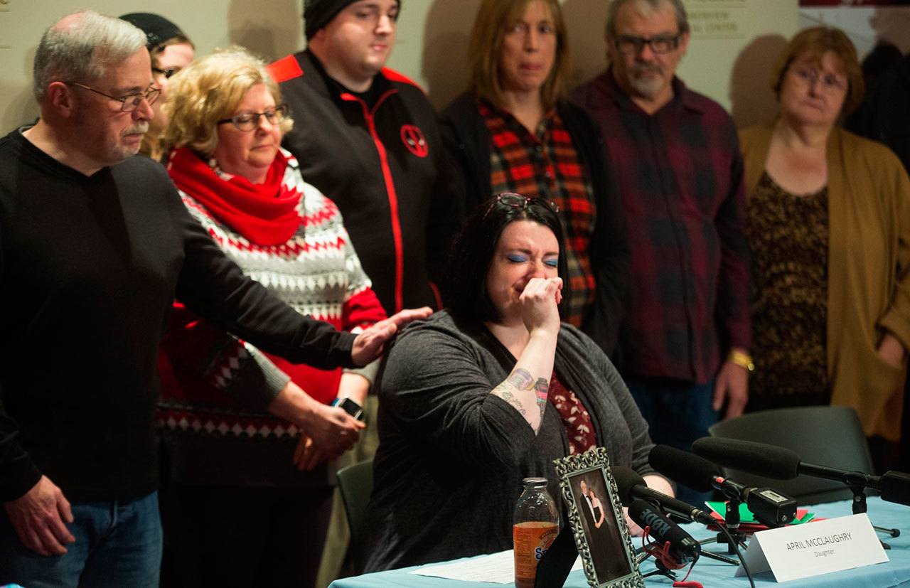 April McClaughry, daughter of Mount Vernon Officer Mike McClaughry, speaks at a news conference at Harborview Medical Center in Seattle on Friday to discuss her father’s condition. Mike McClaughry was shot in the head while responding to a call last week. (Ellen M. Banner/The Seattle Times via AP)