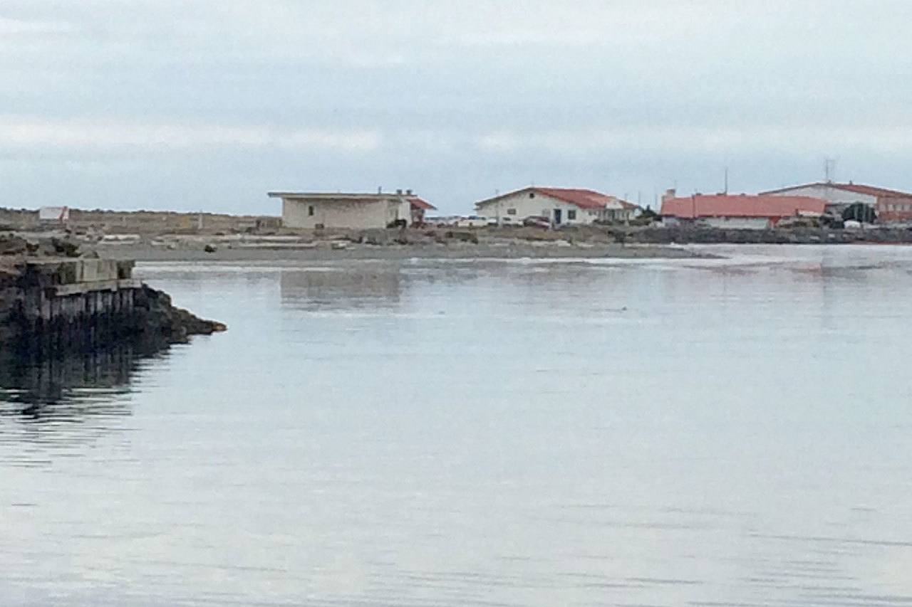 Construction of a new Navy pier at Ediz Hook along the shoreline of Coast Guard Air Station/Sector Field Office Port Angeles will be delayed until July. (Paul Gottlieb/Peninsula Daily News)