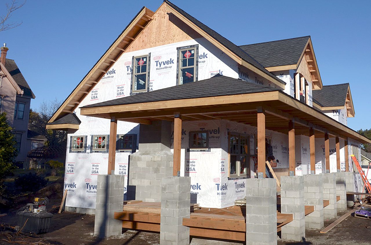 Port Townsend is seeing an increase in building permits for new housing coming in 2016 and 2017 including this home on the corner of Blaine and Tyler Streets. (Cydney McFarland/Peninsula Daily News)