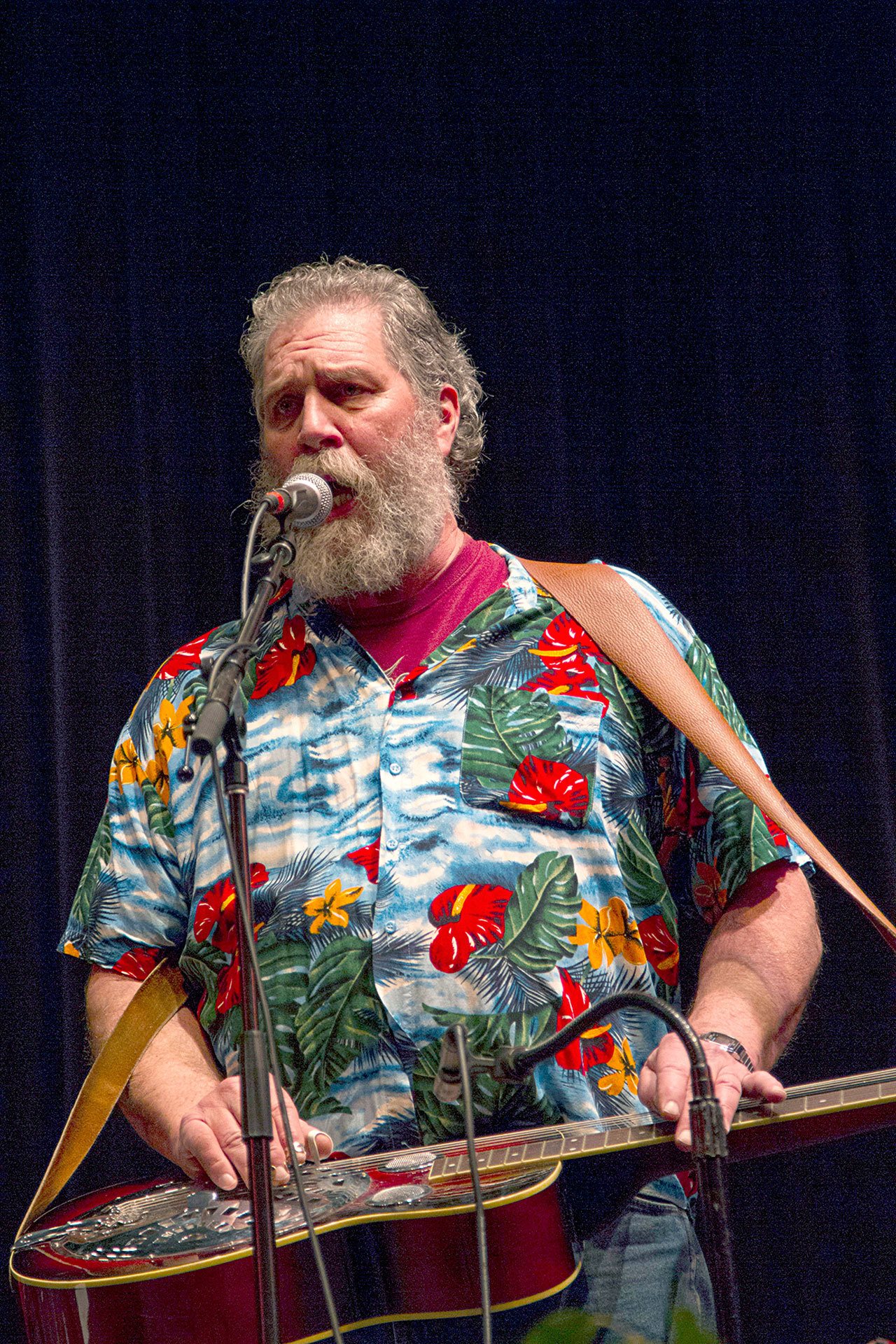 Jerry “Hoof” Sullivan, dobro player for Loose Gravel, performs during Snowgrass in Port Angeles in 2015.