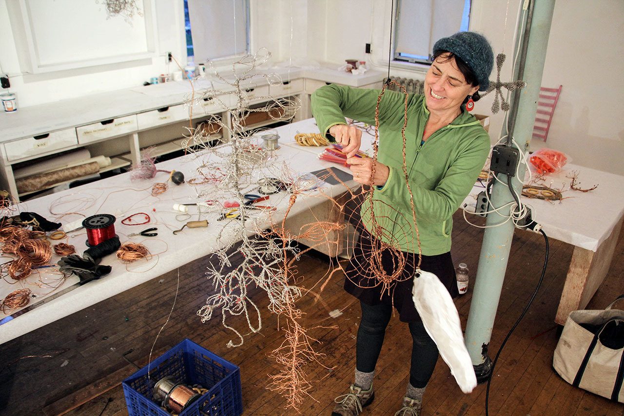 Margie McDonald and her sculptures.