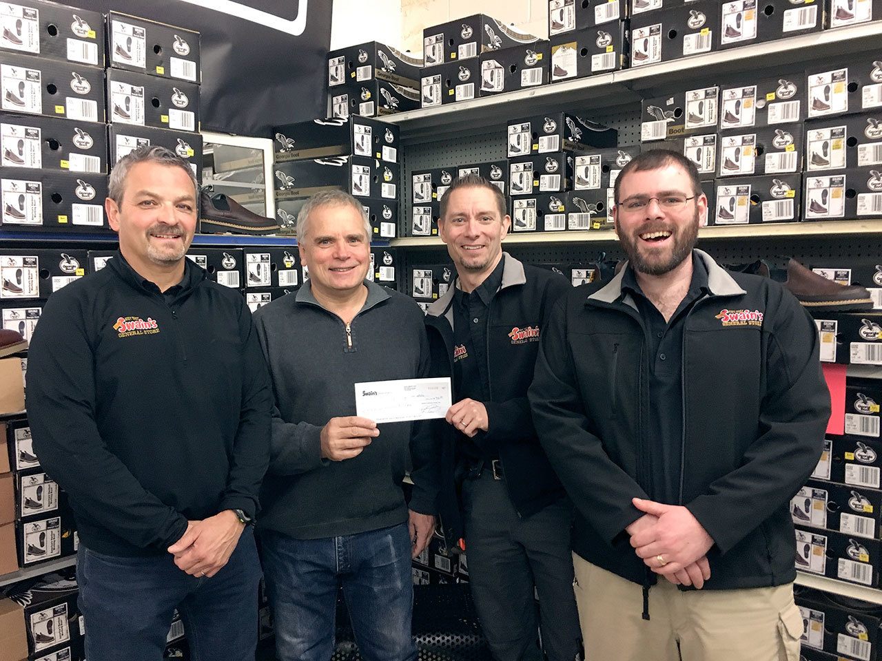 From left to right are Mike Mudd, Mark Urnes, Don Droz and Ryan Gedlund.