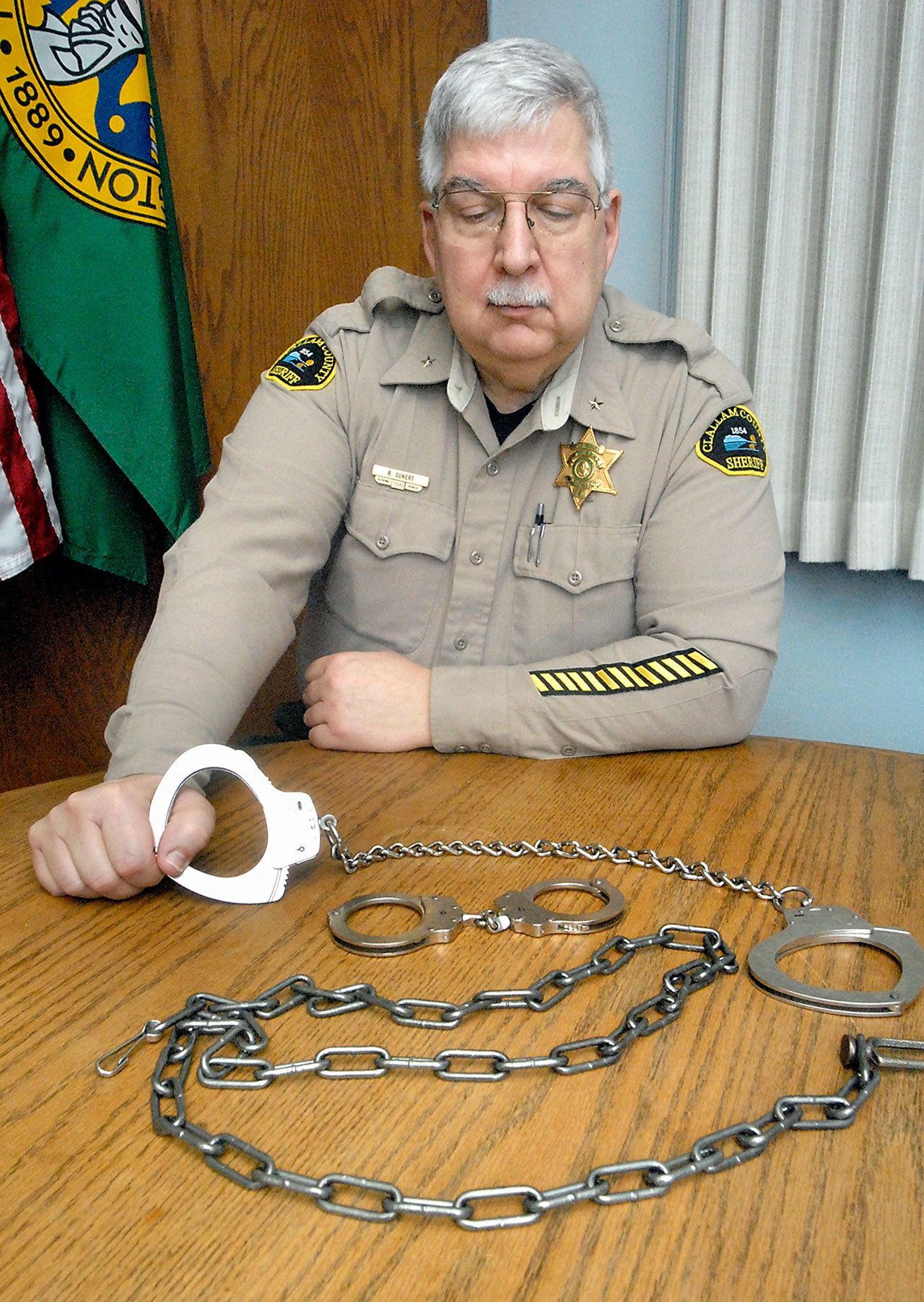 Clallam County Chief Corrections Deputy Ron Sukert said shackles and handcuffs have been used to restrain jail inmates in Clallam County District and Superior Court courtrooms since about 1980. (Keith Thorpe/Peninsula Daily News)