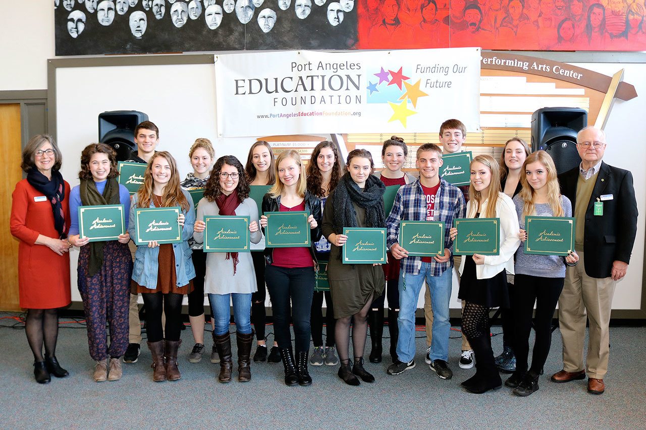 Port Angeles High School 2017 Academic Achievement Award recipients pose with Port Angeles Education Foundation Academic Achievement Awards Chair Annette Wendel, left, and foundation President Bill Kindler, right. From left are Wendel, Kacey Casad, Grayson Peet, Claire Fritschler, Nikaila Price, Lael Butler, Olivia Due, Laura Nutter, Maya Wharton, Kristin Kirkman, Leah Haworth, Ben Basden, Noah McGoff, Emily Traughber, Grace Sanwald, Wesleyanne Rayment and Kindler. (Port Angeles School District)
