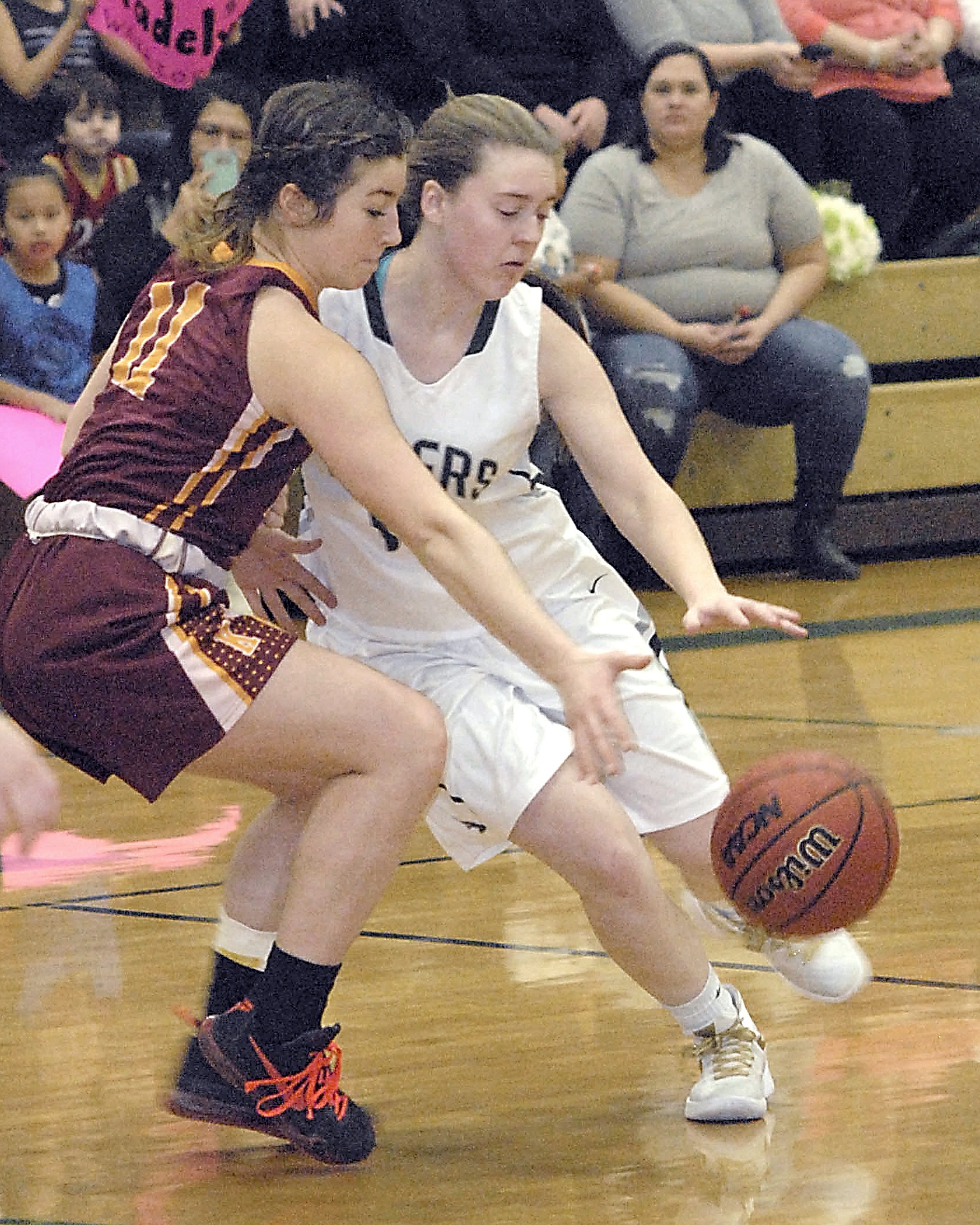 Keith Thorpe/Peninsula Daily News Port Angeles’ Lauren Lunt, right, and Kingston’s Emma Eliason compete for the ball during their Feb. 2 game at Port Angeles High School.