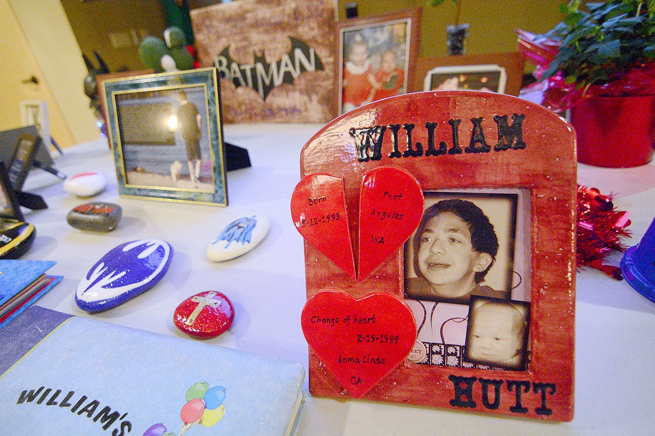 A photo of William Hutt sits on a table at Hutt’s celebration of life in Port Angeles on Sunday. (Jesse Major/Peninsula Daily News)