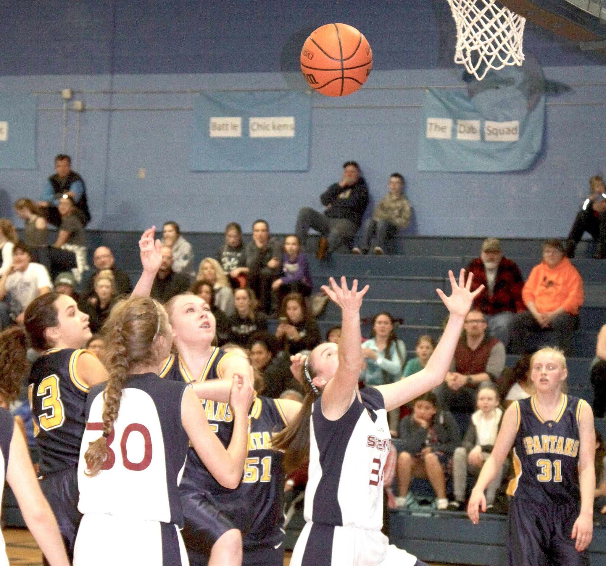 Dave Logan/for Peninsula Daily News                                The Stevens Middle School eighth-grade team easily handled the Forks Middle School Spartans 66-9 at the Stevens gym on Monday. Stevensis now 3-0 on their season. The Stevens seventh-grade girls also beat Forks 54-9. Stevens was led by 13 points from Hannah Reetz and 11points from Jaida Wood. From left, are Chloe Leverington, Forks; Natalie Schmidt, Stevens; Colbie Rancourt, Forks; Lillie Martin, Forks; JadaCargo, Stevens; Kesia Rowley, Forks.