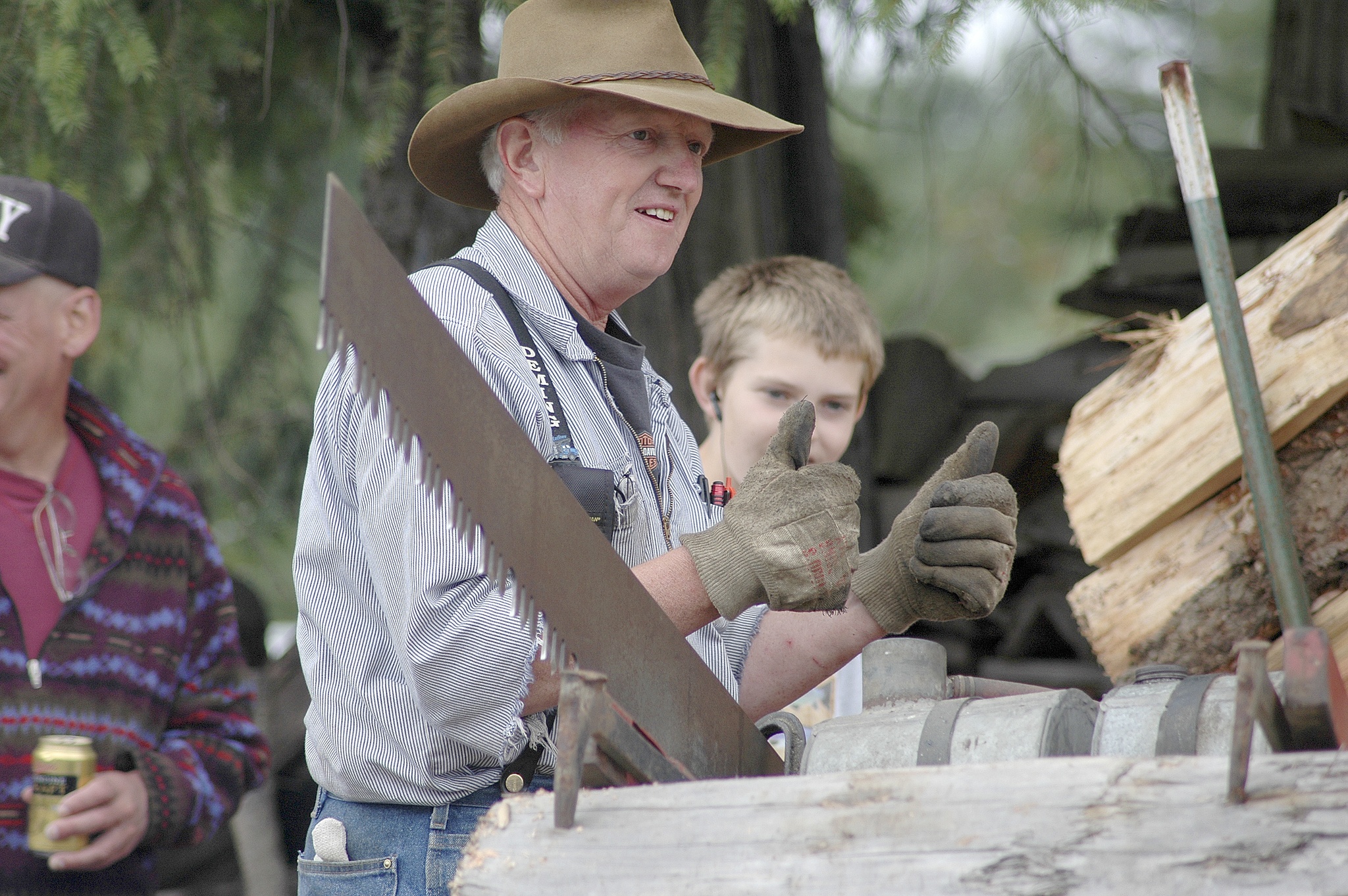 Erin Hawkins/Olympic Peninsula News Group                                Clockwise from top left are 2016 Sequim Citizen of the Year candidates Dave Bekkevar, giving a thumbs-up in September 2010 after successfully sawing off a piece of wood with an old-fashioned chain saw at his family’s farm centennial celebration near Blyn; Deon Kapetan at the Sequim Irrigation Festival float unveiling at 7 Cedars Casino in Blyn in 2016; 10-year-old River Jensen of Carlsborg handing out gift bags full of socks, hats and toiletries at the Salvation Army in Port Angeles on Dec. 20; and Patsy and David Mattingley.