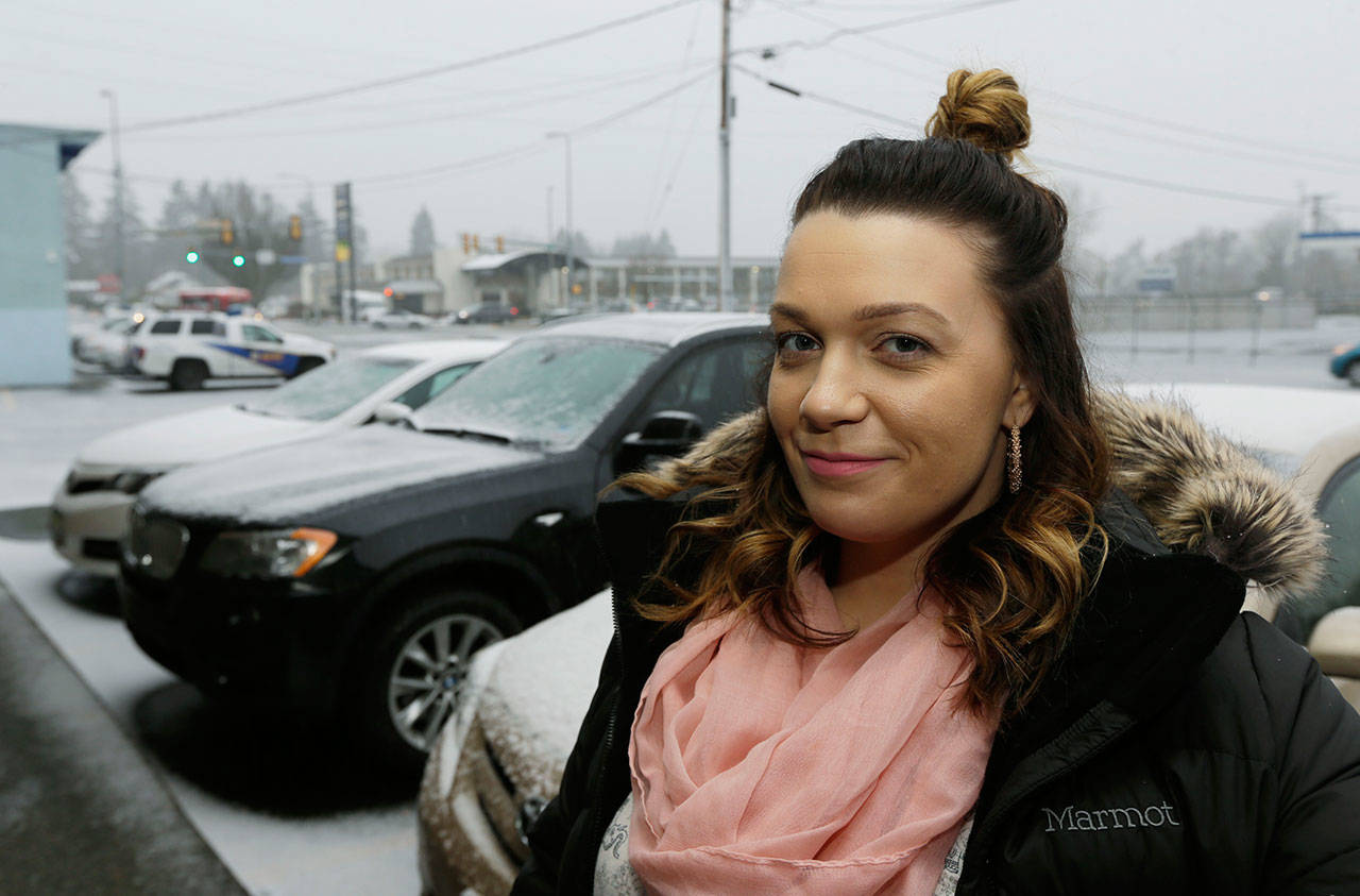 Jessica Wolfe poses for a photo Feb. 27 in the doorway of The Genesis Project, a drop-in center in SeaTac for victims of sex trafficking. (Ted S. Warren/The Associated Press)