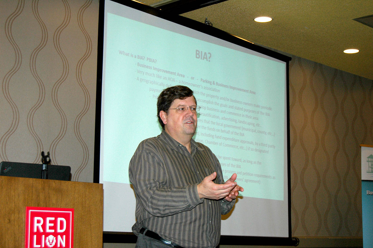 Marc Abshire, executive director of the Port Angeles Regional Chamber of Commerce, makes a pitch for a tax-based Business Improvement Area. (Paul Gottlieb/Peninsula Daily News)