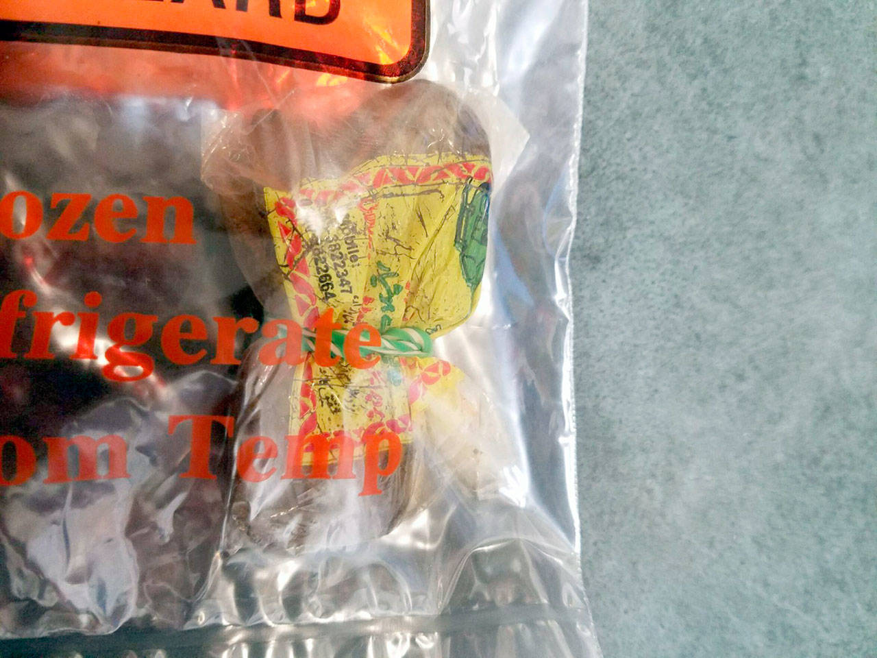 A laundry worker at Olympic Medical Center found an ounce of heroin in a shipment of new laundry from Pakistan. (Olympic Peninsula Narcotics Enforcement Team)