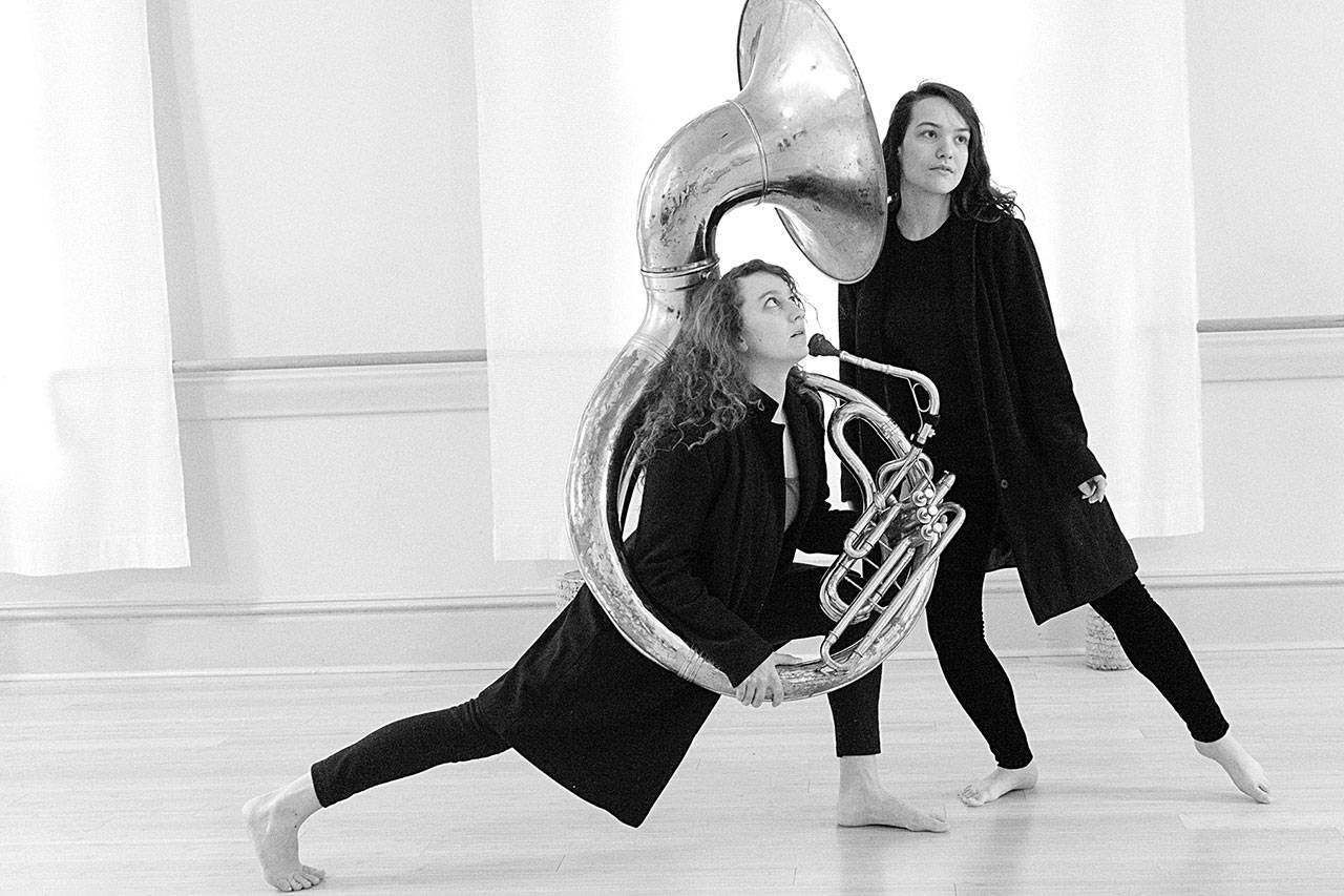 Phina Pipia, left, and Rachel Campanoli rehearse an original dance piece that will be performed Saturday night at St. Paul’s Episcopal Church in Port Townsend. (Ray Ketcham)