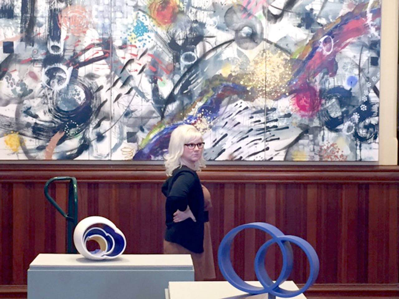 For Port Townsend’s April Gallery Walk, “Pat and Peter Simpson: Collectors and Patrons” will be exhibited at the Jefferson Museum of Art & History. Angie Bartlett of Port Townsend is shown admiring work by Stephen Yates and Anne Hirondelle.