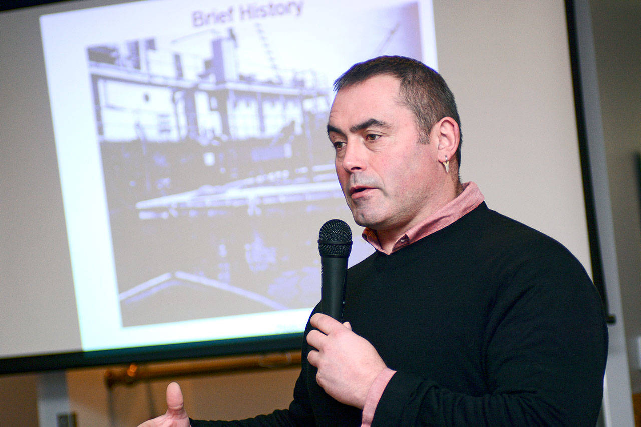 Innes Weir, general manager of Seattle-based Cooke Aquaculture Pacific LLC, told Port Angeles Business Association members Tuesday the business plans to relocate its Atlantic-salmon farming operation due to the U.S. Navy’s pier project on Ediz Hook. (Jesse Major/Peninsula Daily News)